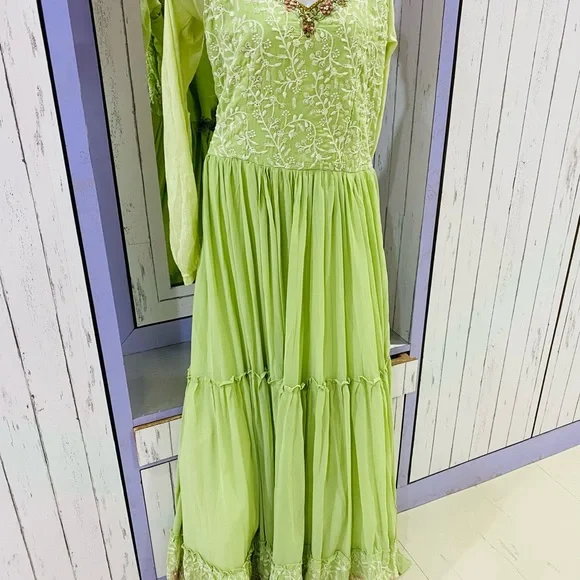 Full flaired beautifully embroidered pastel green gown for party wear - Picture 5 of 11